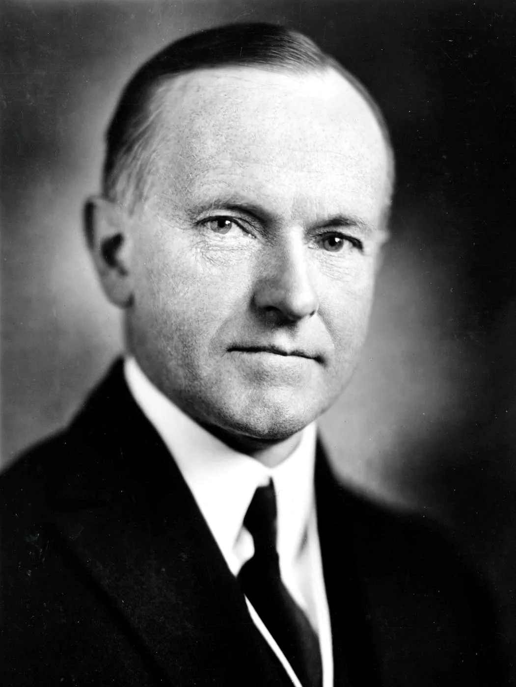 Official 1924 portrait photograph of President Calvin Coolidge by Harris & Ewing