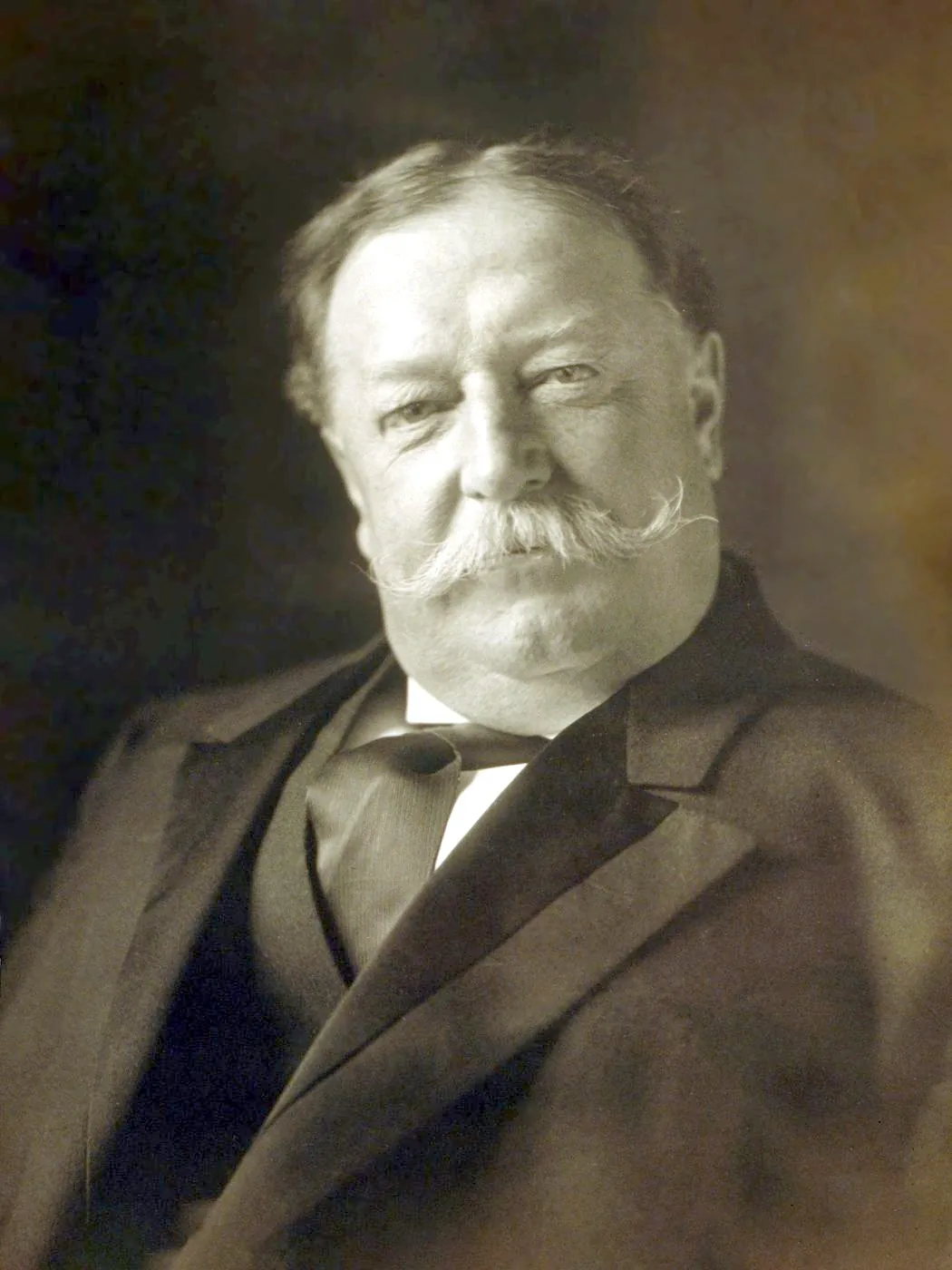 Head-and-shoulders photographic portrait of William Howard Taft, facing front, from the Library of Congress